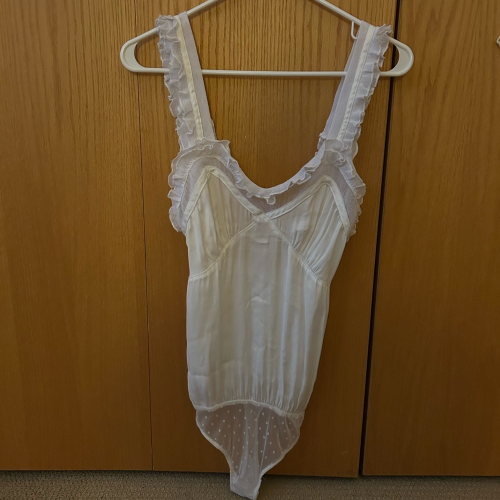 Free People Intimately beautiful bodysuit. Great condition. Size is Medium